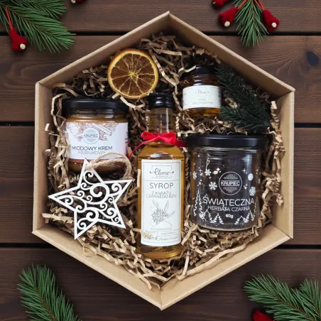 Wnętrze świątecznego zestawu z syropem, miodem i herbatą