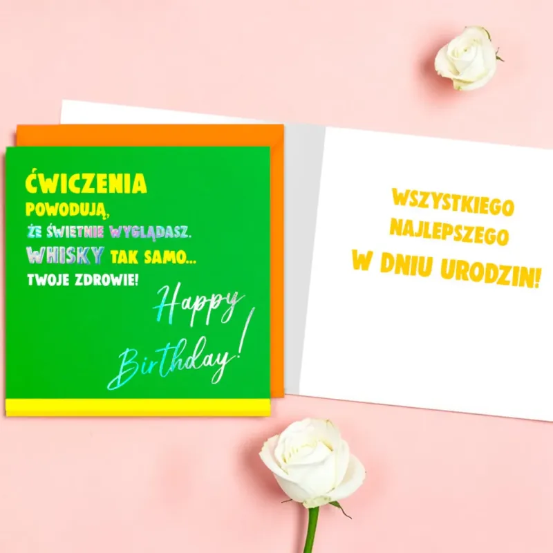 Neonowy karnet Quadro z tekstem o whisky i pomarańczową kopertą.