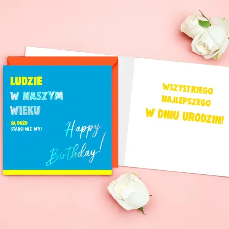 Neonowy karnet Quadro z zabawnym napisem i pomarańczową kopertą.